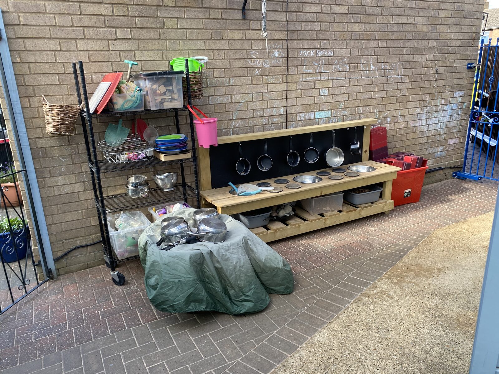 Outdoor mud kitchen for messy play